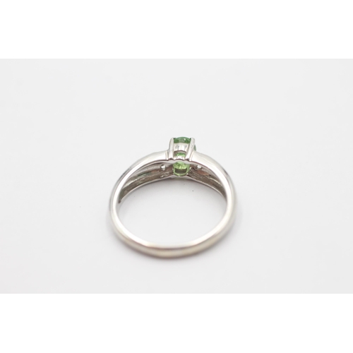 1026 - A 9ct white gold tsavorite garnet and diamond ring, size N½ - approx. gross weight 3 grams