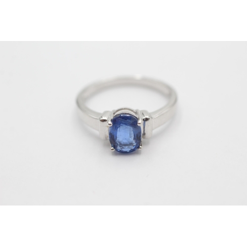 1028 - A 9ct white gold kyanite solitaire ring, size N½ - approx. gross weight 2.9 grams