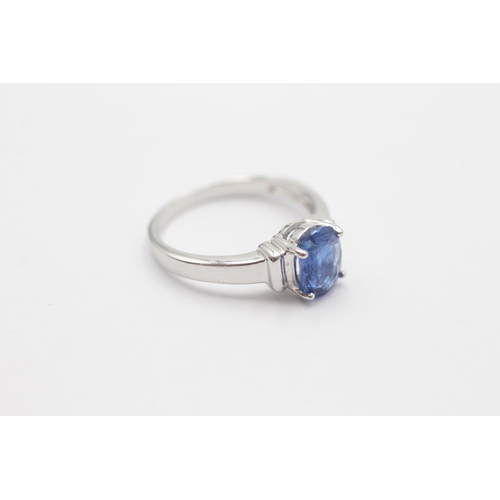 1028 - A 9ct white gold kyanite solitaire ring, size N½ - approx. gross weight 2.9 grams