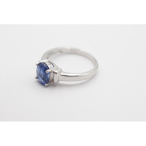 1028 - A 9ct white gold kyanite solitaire ring, size N½ - approx. gross weight 2.9 grams