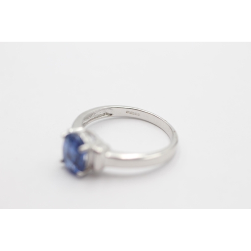 1028 - A 9ct white gold kyanite solitaire ring, size N½ - approx. gross weight 2.9 grams