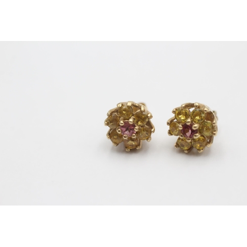 1029 - A pair of 9ct gold yellow sapphire and pink tourmaline stud earrings - approx. gross weight 2.4 gram... 