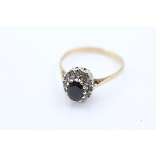 1032 - A 9ct gold sapphire and diamond halo ring, size R - approx. gross weight 2.9 grams