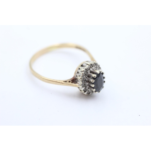 1032 - A 9ct gold sapphire and diamond halo ring, size R - approx. gross weight 2.9 grams