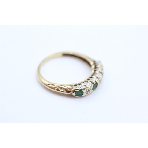 1037 - A 9ct gold emerald and diamond ring, size L - approx. gross weight 1.9 grams