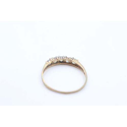 1039 - A 9ct gold clear gemstone five stone ring, size J½ - approx. gross weight 0.8 grams