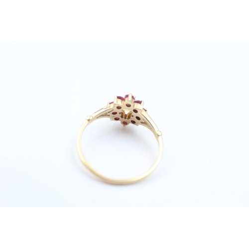 1044 - A 9ct gold opal and ruby ring, size M½ - approx. gross weight 1.4 grams