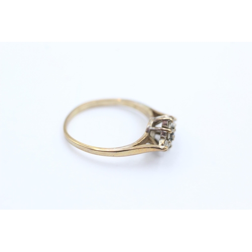 1051 - A 9ct gold sapphire and CZ ring, size J½ - approx. gross weight 1.4 grams