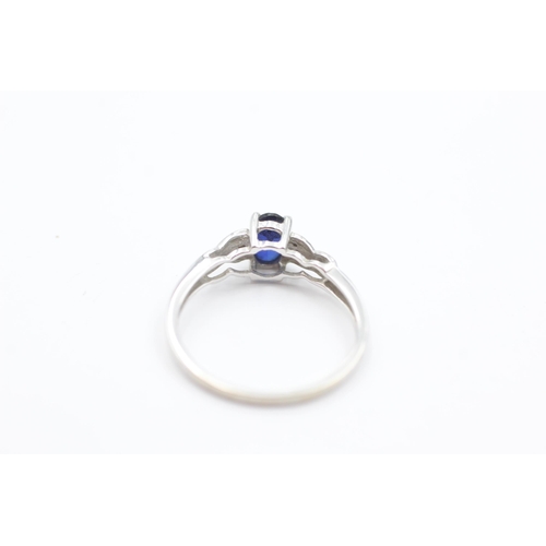 1056 - A 9ct white gold sapphire and diamond ring, size M½ - approx. gross weight 1.5 grams