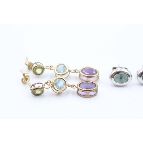 1057 - Three pairs of 9ct gold gemstone earrings, two topaz and one amethyst, peridot and aquamarine - appr... 