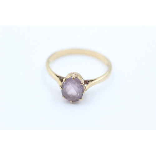 1058 - A 9ct gold amethyst solitaire ring, size T½ - approx. gross weight 3.4 grams