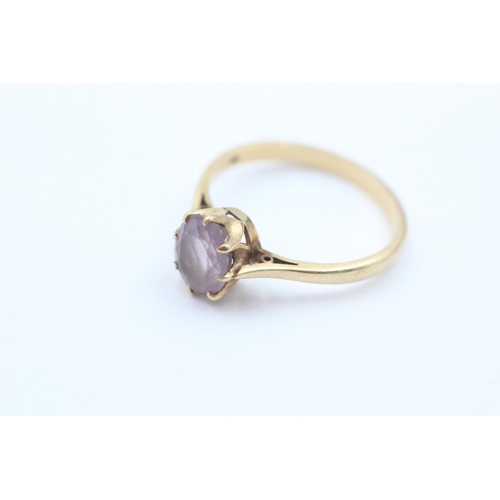 1058 - A 9ct gold amethyst solitaire ring, size T½ - approx. gross weight 3.4 grams