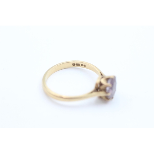 1058 - A 9ct gold amethyst solitaire ring, size T½ - approx. gross weight 3.4 grams