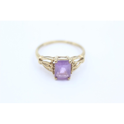 1060 - A 9ct gold amethyst solitaire ring, size O½ - approx. gross weight 1.8 grams