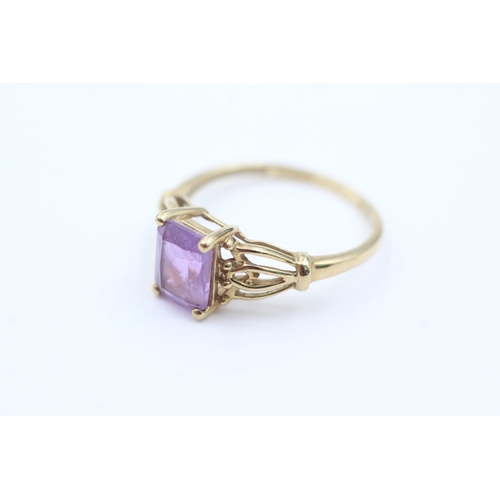 1060 - A 9ct gold amethyst solitaire ring, size O½ - approx. gross weight 1.8 grams