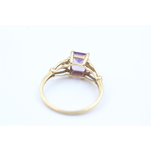 1060 - A 9ct gold amethyst solitaire ring, size O½ - approx. gross weight 1.8 grams