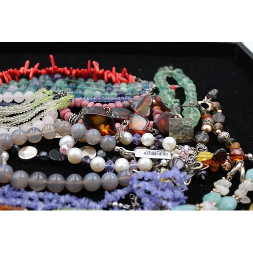 1063 - Fifteen .925 silver gemstone bracelets to include amber, peridot, agate etc. - approx. gross weight ... 