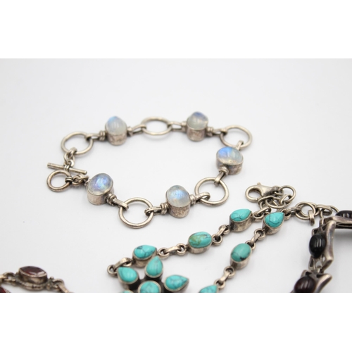 1090 - Four .925 silver gemstone bracelets to include moonstone, garnet etc. - approx. gross weight 56 gram... 