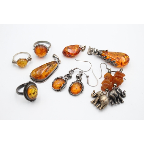 1093 - Eight pieces of .925 silver amber jewellery to include pendants, earrings etc. - approx. gross weigh... 