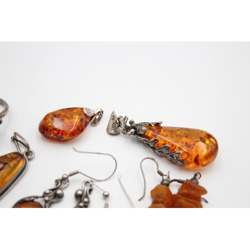 1093 - Eight pieces of .925 silver amber jewellery to include pendants, earrings etc. - approx. gross weigh... 