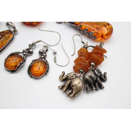 1093 - Eight pieces of .925 silver amber jewellery to include pendants, earrings etc. - approx. gross weigh... 