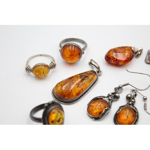 1093 - Eight pieces of .925 silver amber jewellery to include pendants, earrings etc. - approx. gross weigh... 