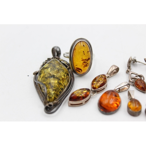 1095 - Ten pieces of .925 silver amber jewellery to include pendants, bracelets etc. - approx. gross weight... 