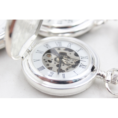 1164 - Four transport themed hand-wind pocket watches