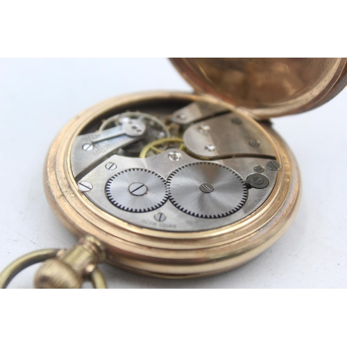 1167 - A rolled gold open face hand-wind pocket watch - approx. gross weight 102 grams