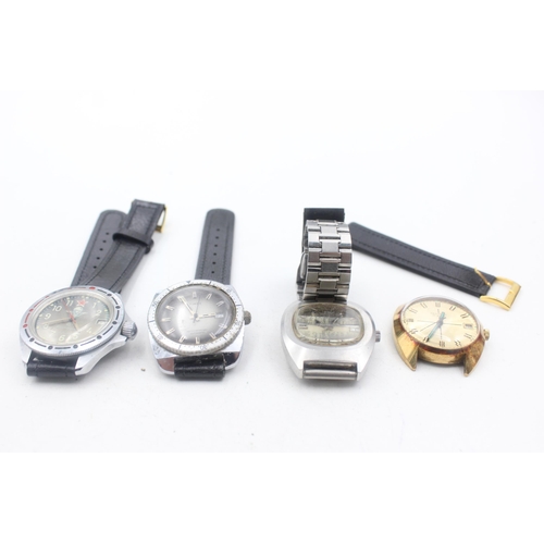 1187 - Four vintage mechanical men's wristwatches to include Vostok, Timex, Sekonda etc.