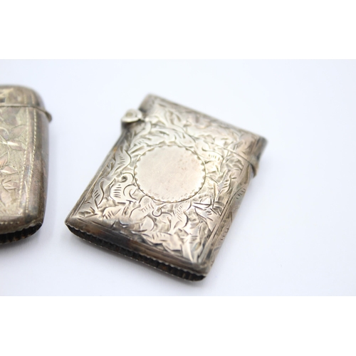 1213 - Two hallmarked sterling silver vesta cases - approx. gross weight 24 grams