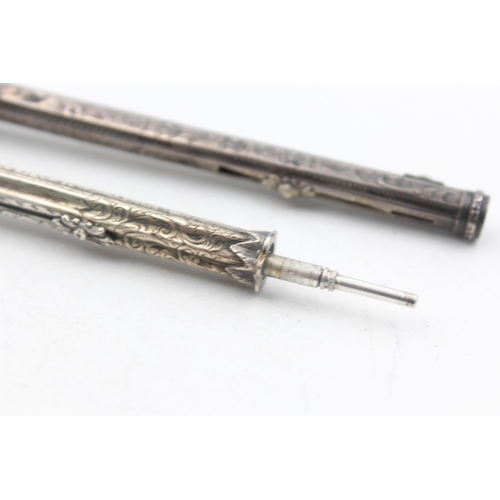 1221 - Two silver propelling pencils, one .830 and one .850 - approx. gross weight 37 grams