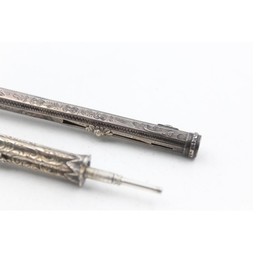 1221 - Two silver propelling pencils, one .830 and one .850 - approx. gross weight 37 grams