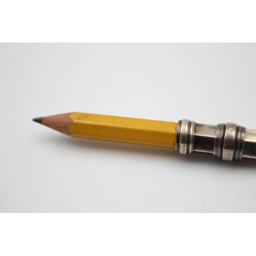 1225 - Two hallmarked sterling silver propelling pencils, one with wax seal - approx. gross weight 9 grams