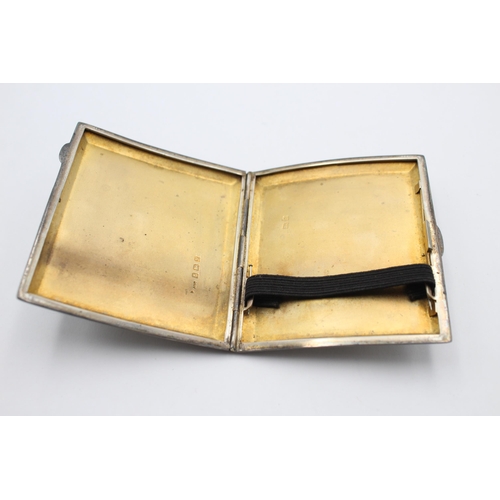 1229 - A George V hallmarked Birmingham silver cigarette case, dated 1923 - approx. gross weight 76 grams a... 