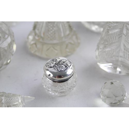 1239 - Seven hallmarked sterling silver and glass vanity jars