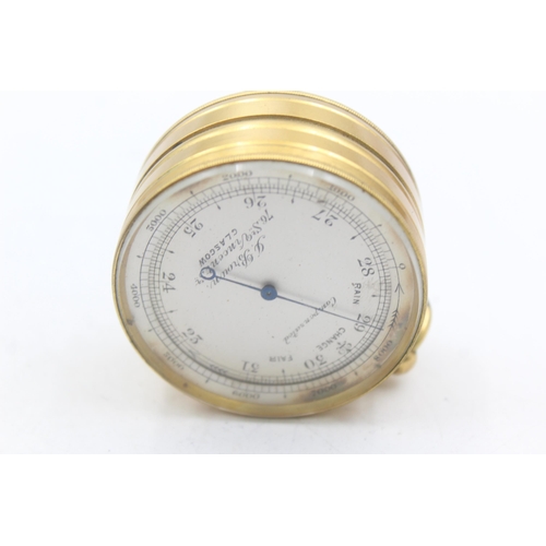 1260 - An antique leather cased J. Brown brass pocket barometer, thermometer and compass - approx. 69mm x 5... 