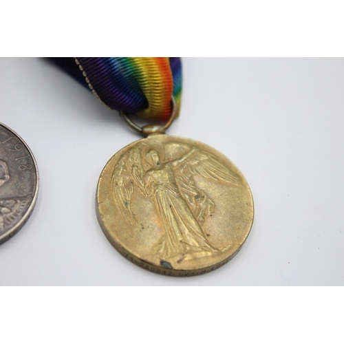 1272 - A WWI medal pair with original ribbons presented to T4/236547 DVR H. Lowe A.S.C