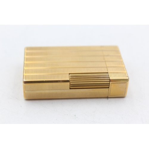 1282 - A vintage S.T. Dupont gold plated cigarette lighter - model no. 858AFC