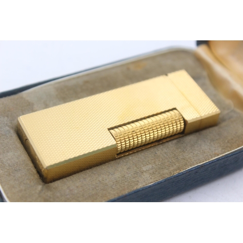 1283 - A boxed Dunhill Rolagas gold plated cigarette lighter - approx. gross weight 79 grams