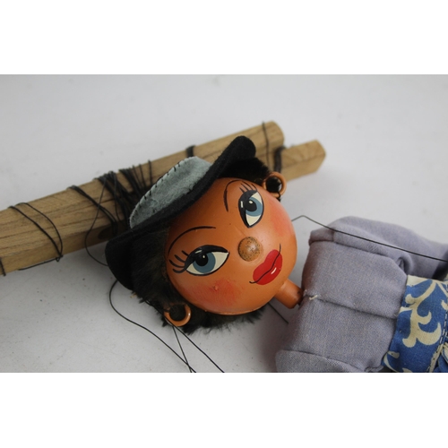 330 - A 1950s boxed Pelham Puppets 'Mex Girl' 26cm marionette