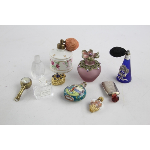 346 - Ten perfume bottles to include cut glass, Oriental etc.