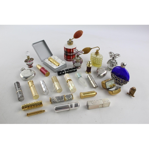 354 - A collection of vintage scent bottles and atomisers to include silver plate, mother of pearl etc.