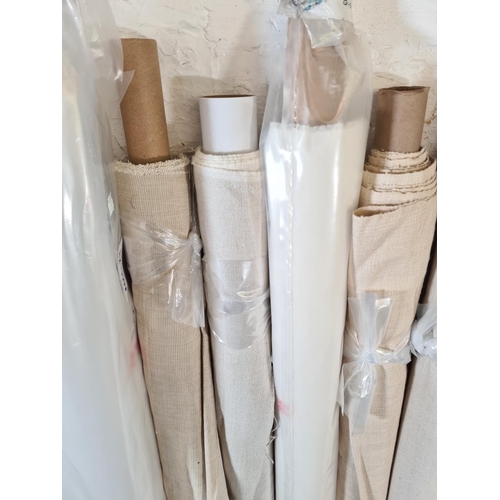 54 - Fifteen rolls of good quality fabric