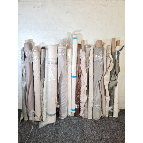 55 - Eighteen rolls of good quality fabric