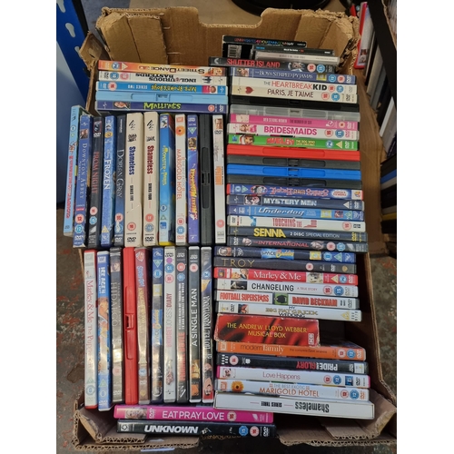 525 - Two boxes containing a collection of DVDs - see images for titles