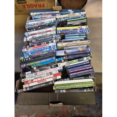 527 - Three boxes containing a collection of DVDs - see images for titles