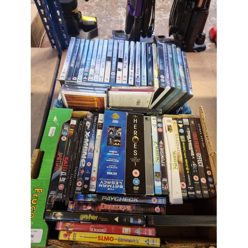 528 - Three boxes containing a collection of DVDs - see images for titles