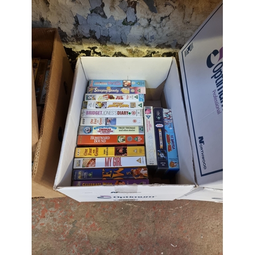 537 - Six boxes containing a large collection of VHS videos - see images for titles