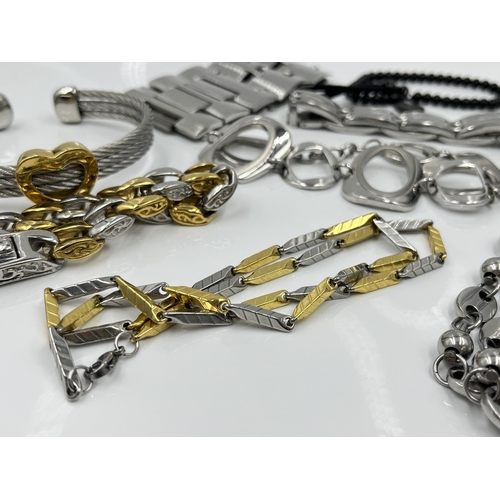 1098 - A collection of stainless steel jewellery to include Fossil, Citizen etc.